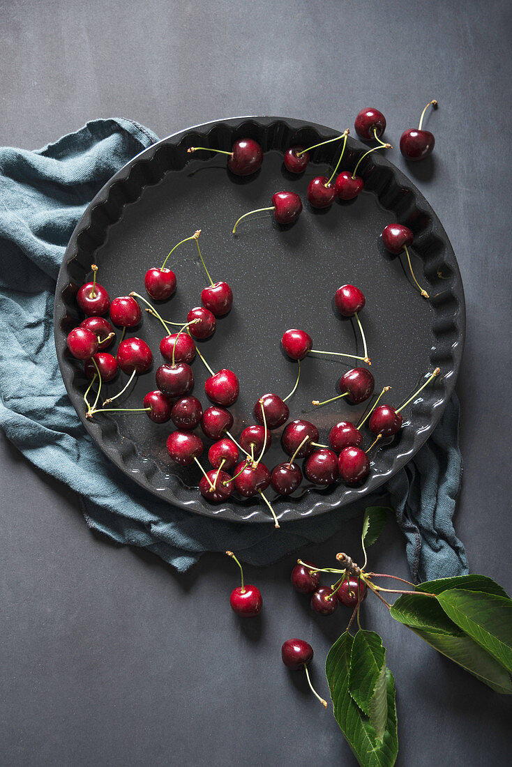 Fresh sweet cherries (Prunus avium) in a baking dish