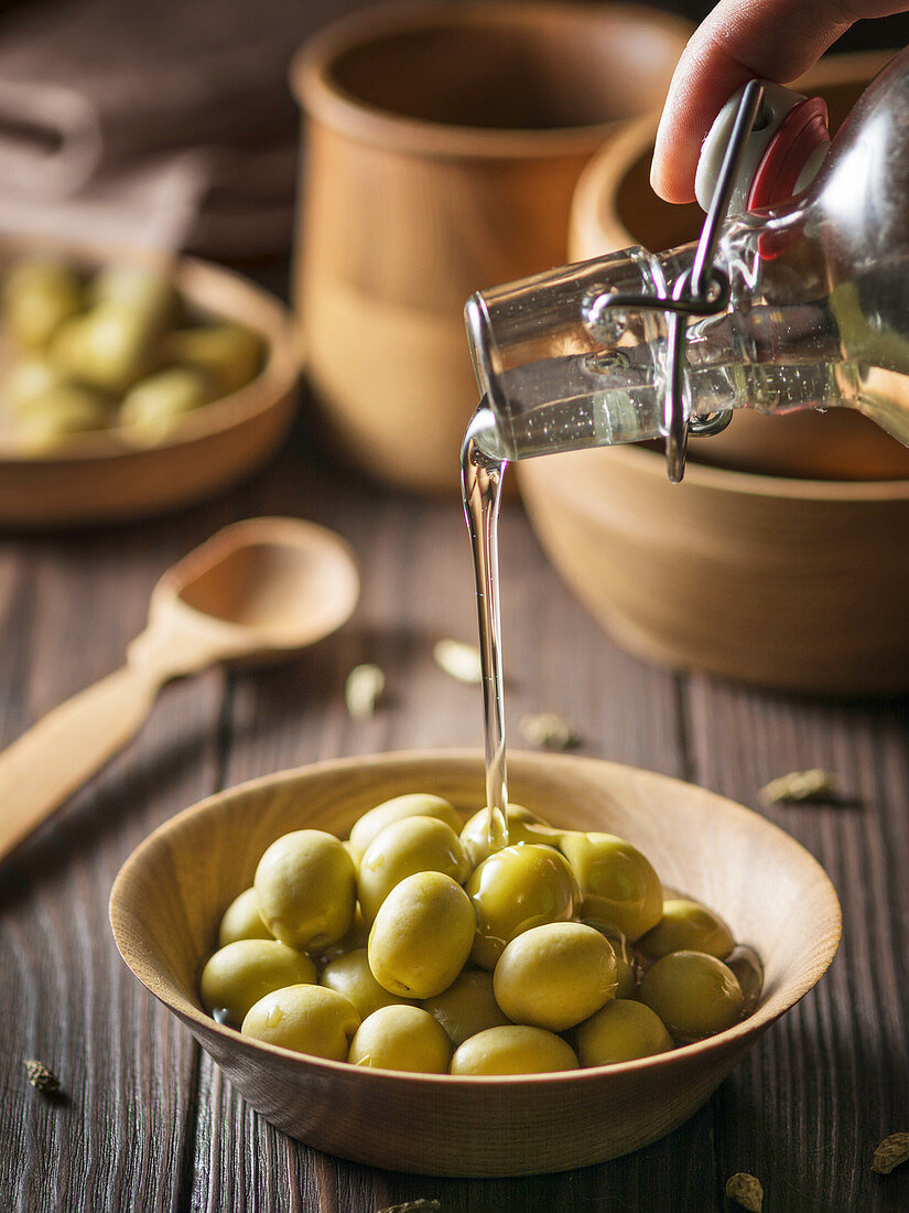 Olives and olive oil in a bottle