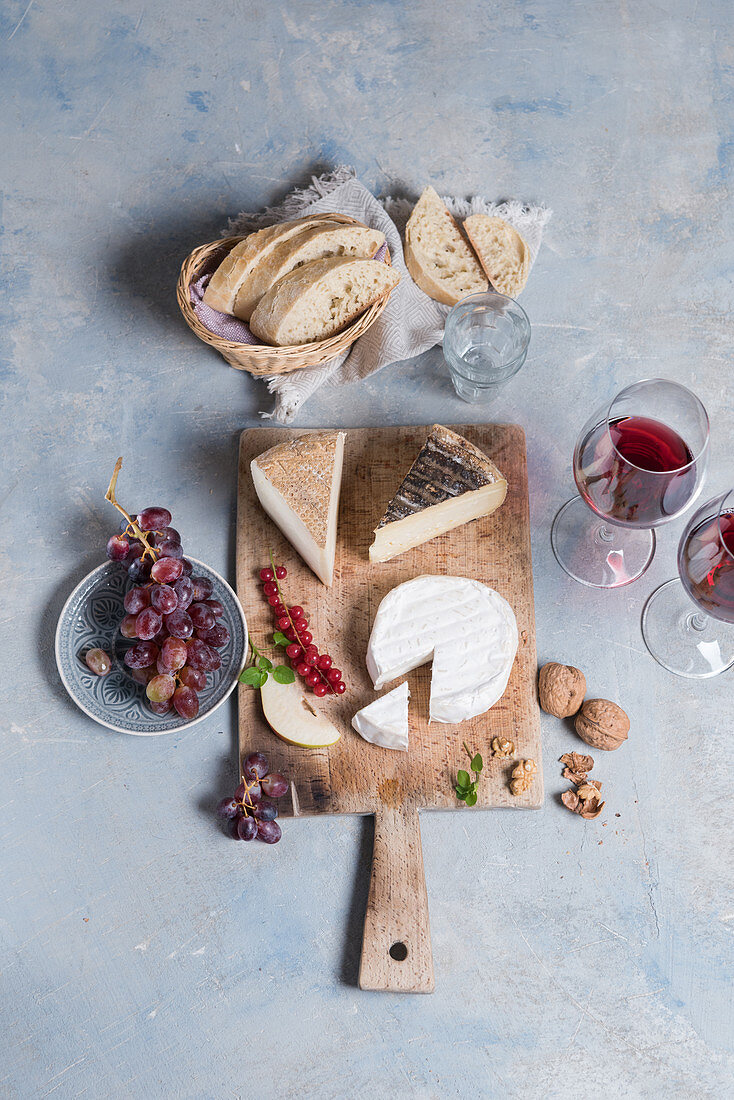 A cheese selection with red wine
