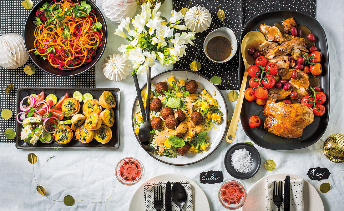 Festive xmas menue with lamb, mini pies, veggie pasta and mango salad