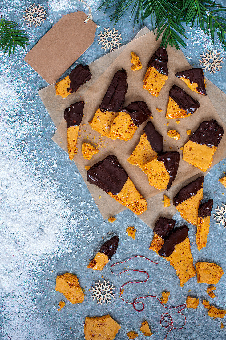 Homemade honeycomb dipped in dark chocolate for christmas, view from above