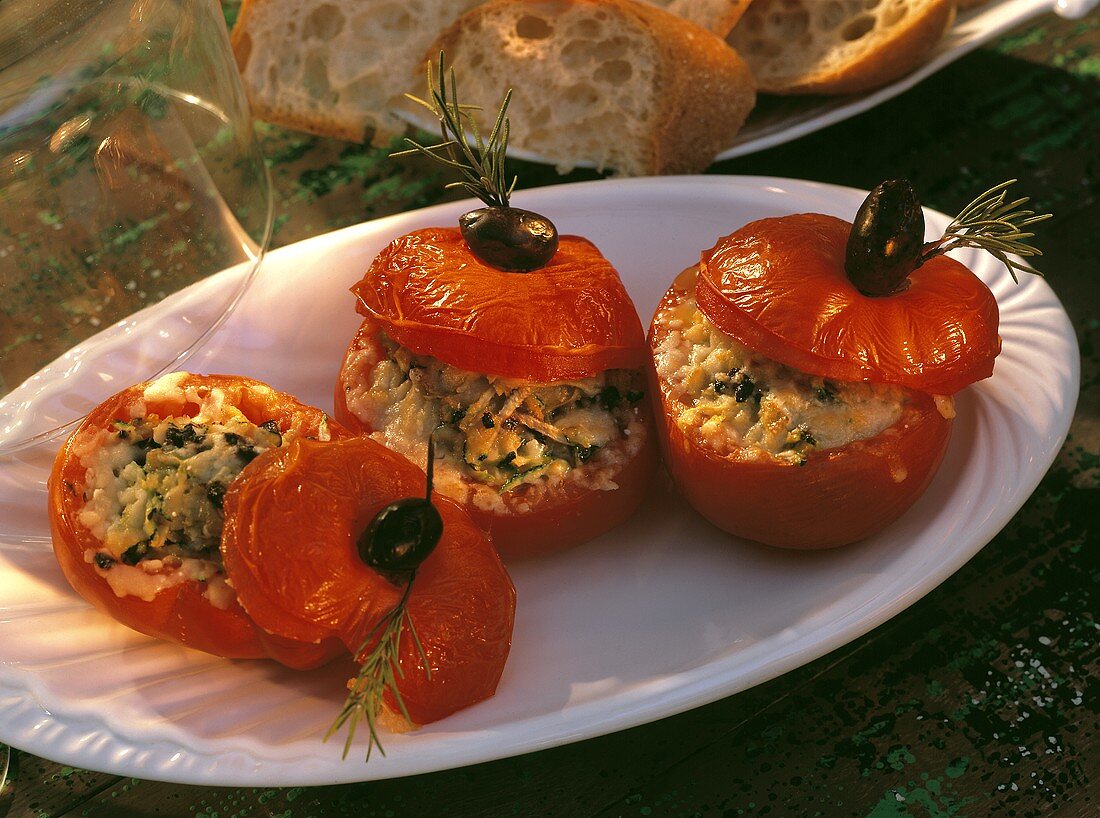 Grilled Tomato Stuffed with Rice; Zucchini and Olive