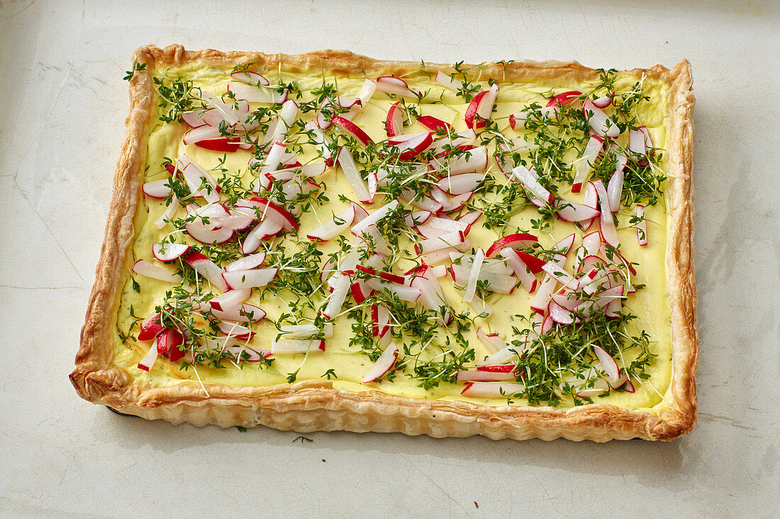 Herb tart with a radish topping