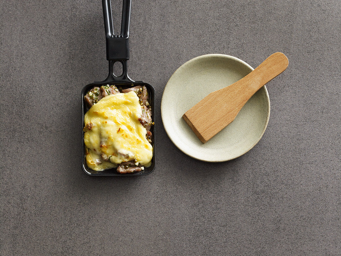 Beef and gouda raclette with honey