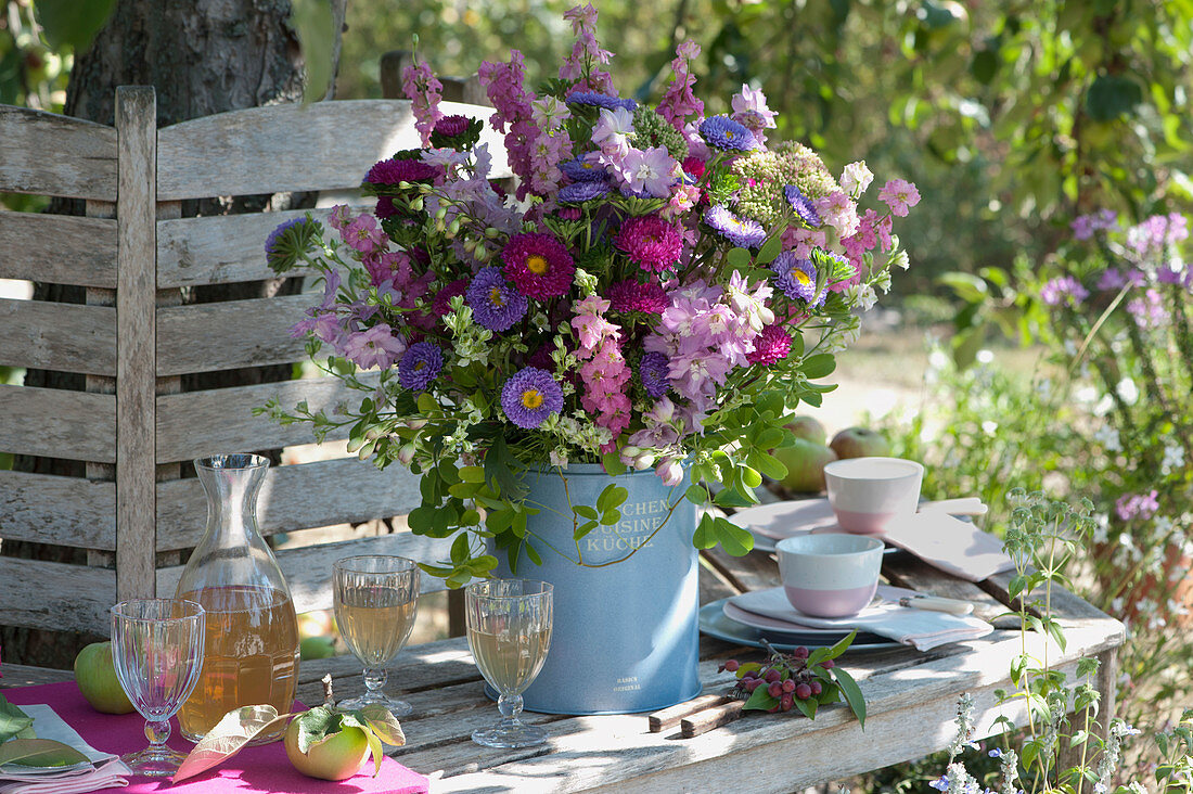 Late Summer Bouquet Of Summer Asters, Larkspur, Stonecrop And Climbing Cucumber