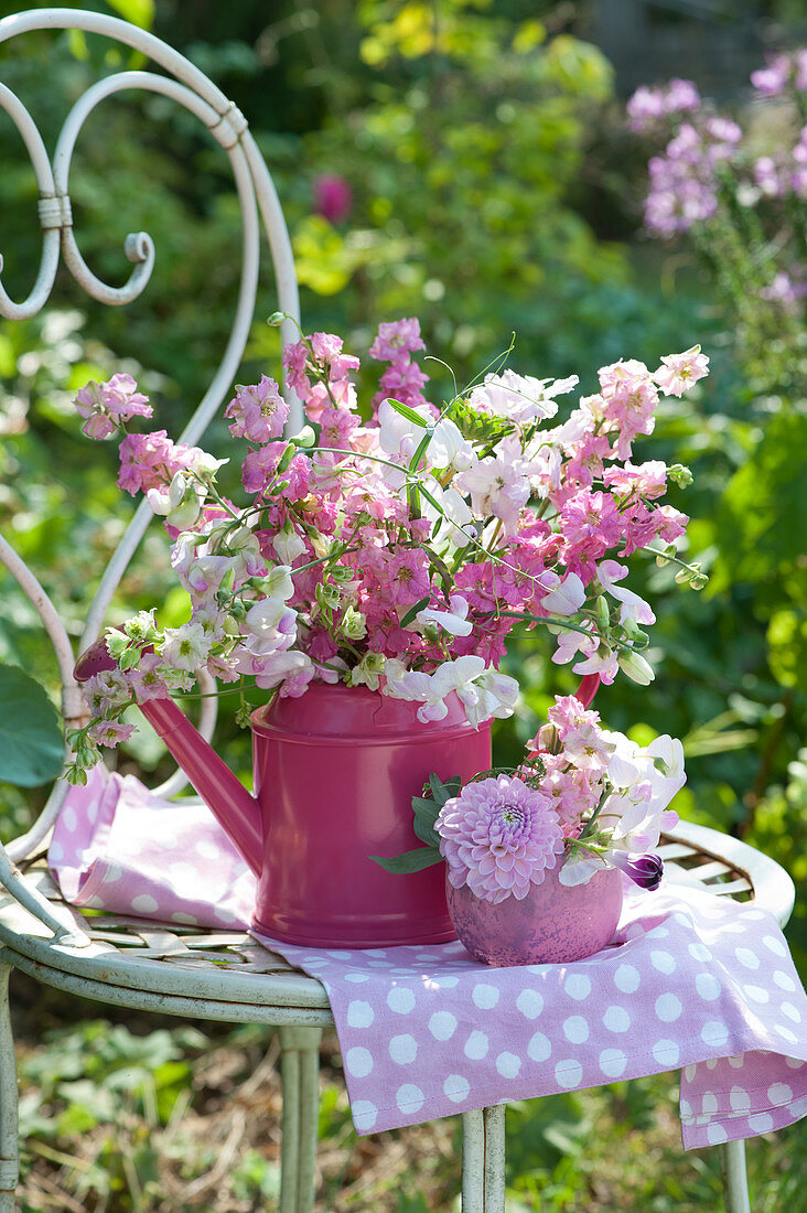 Bouquet Of Larkspur And Vetch In Pink Watering Can