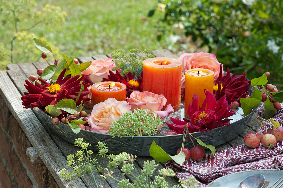 Dahlias And Rose Petals With Candles In Bowl With Water