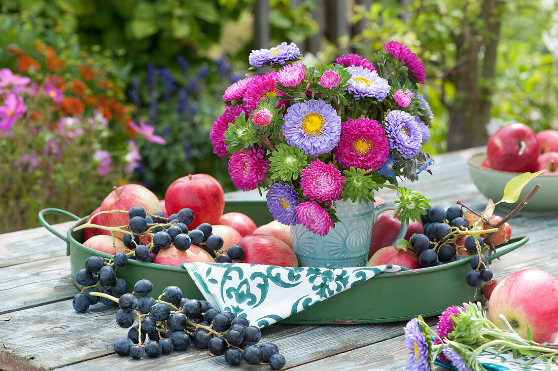 Bouquet With Summer Asters On Tray With Apples And Grapes