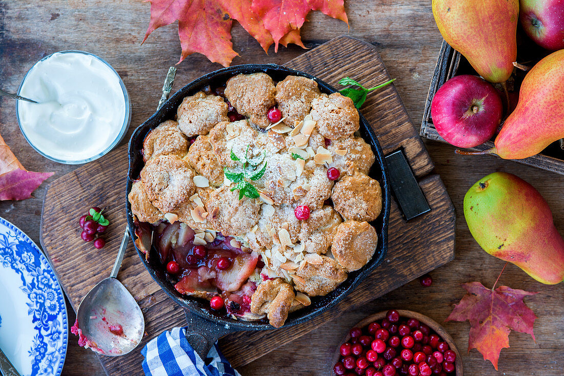 Autumnal pear and apple cobbler with cranberries (seen from above)