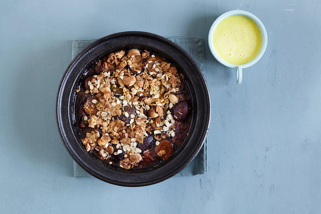 Damsons crunch made in a tagine
