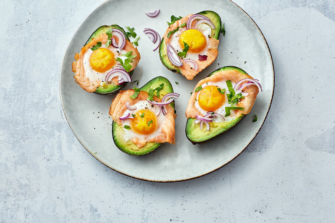 Oven-baked avocado with salmon and eggs