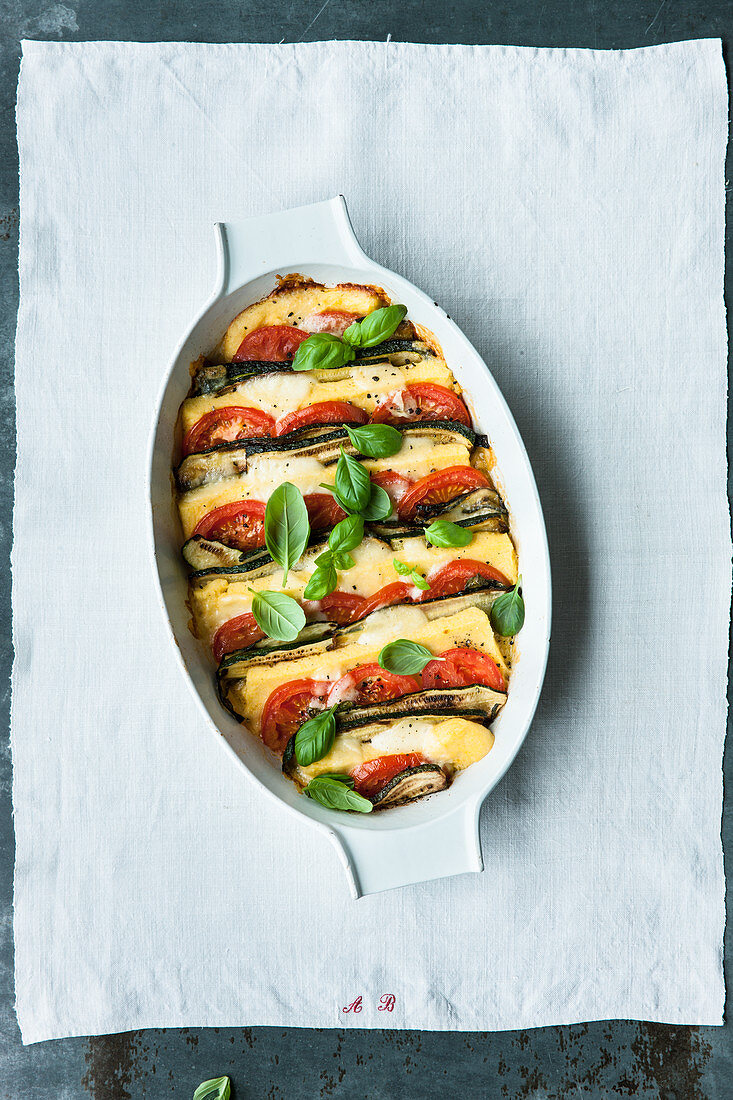 Gluten-free polenta and caprese bake with courgette