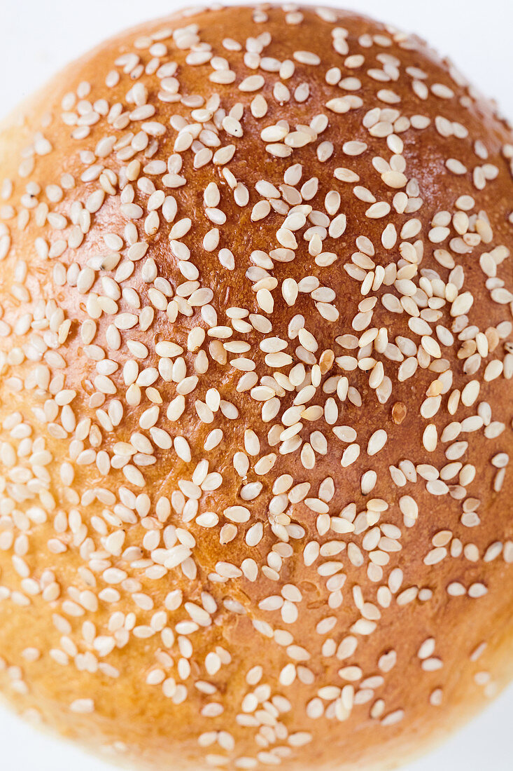 A sesame seed roll (close-up)