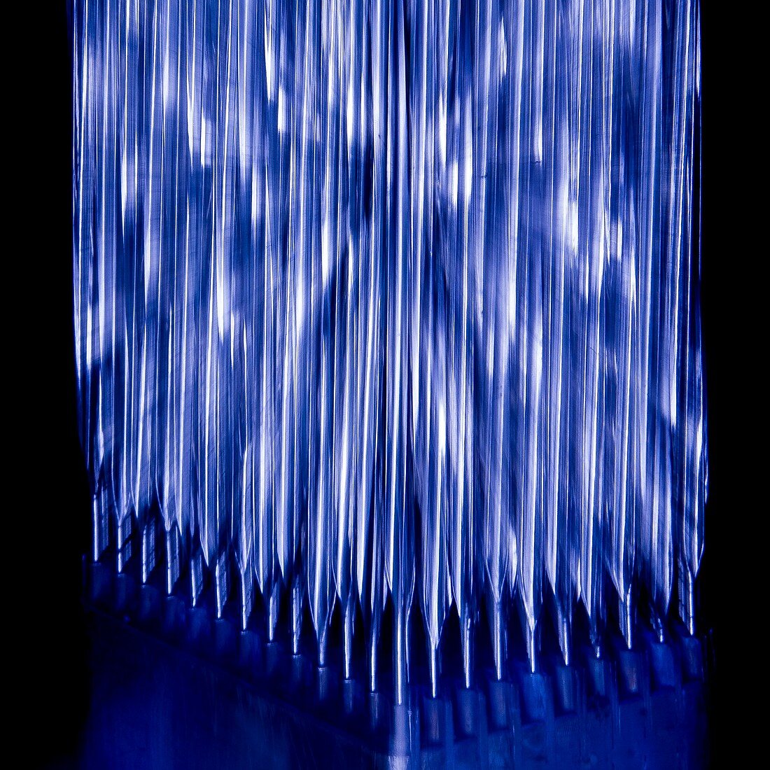 High-neutron-flux nuclear reactor fuel rods, abstract image