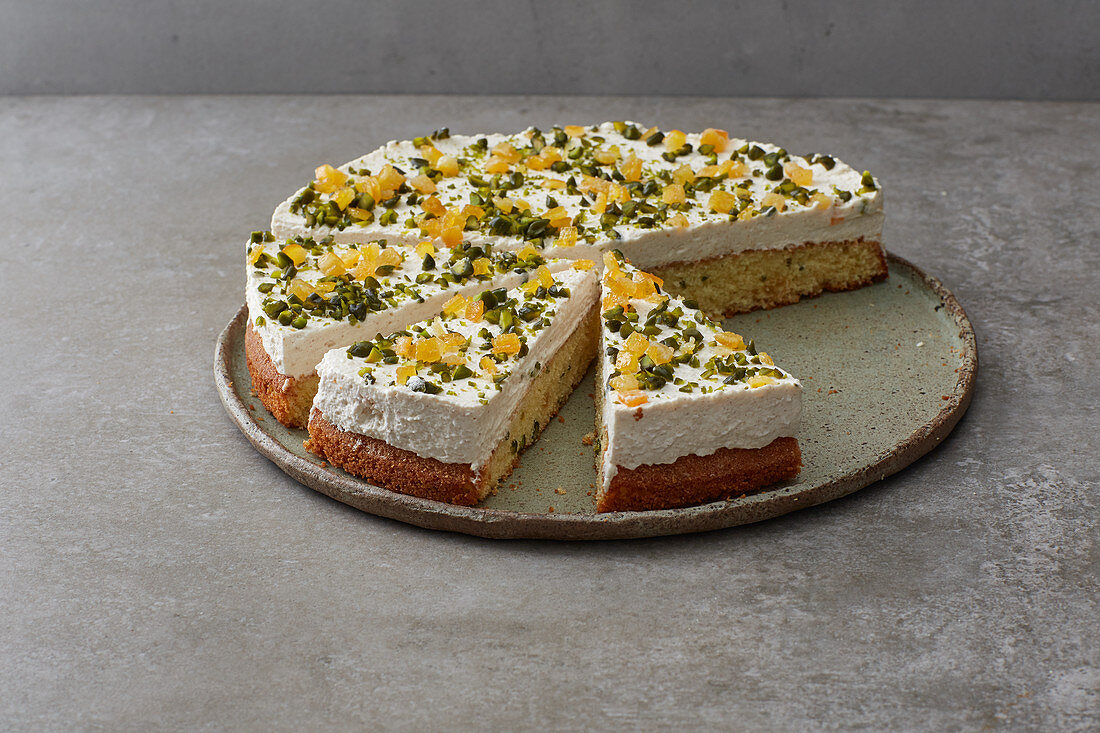 Winter oil-sponge cake with dried orange peel and pistachio nuts