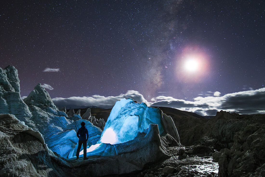 Moon and Milky Way over a glacier