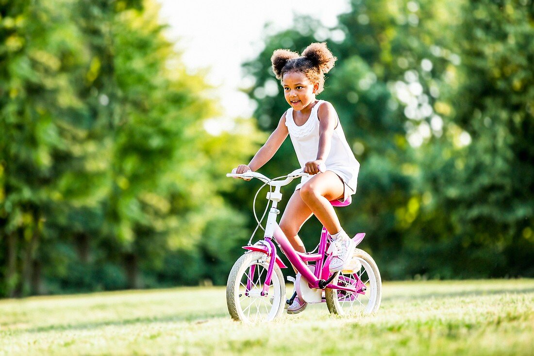 Girl riding bicycle