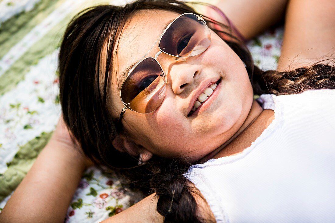 Girl lying on blanket