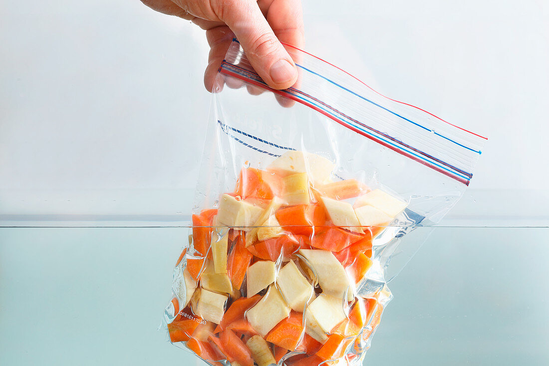 Food being dip vacuum packed