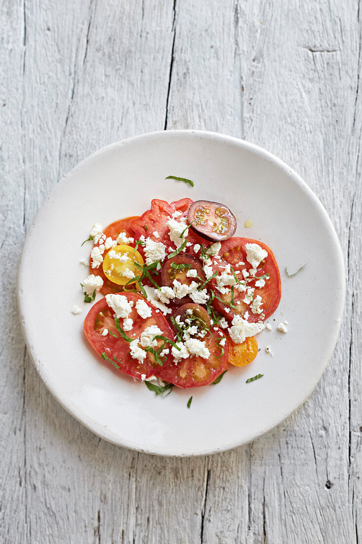 Heritage tomato salad with cheese and basil