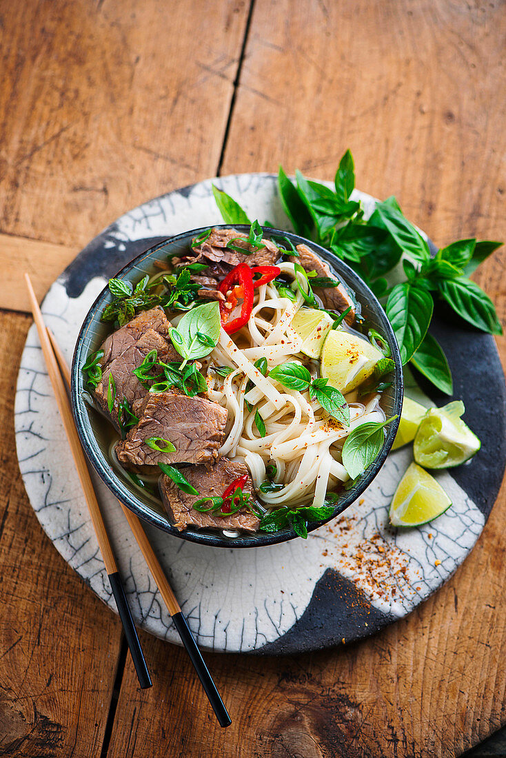 Pho bo (traditional Vietnamese beef and rice noodle soup)