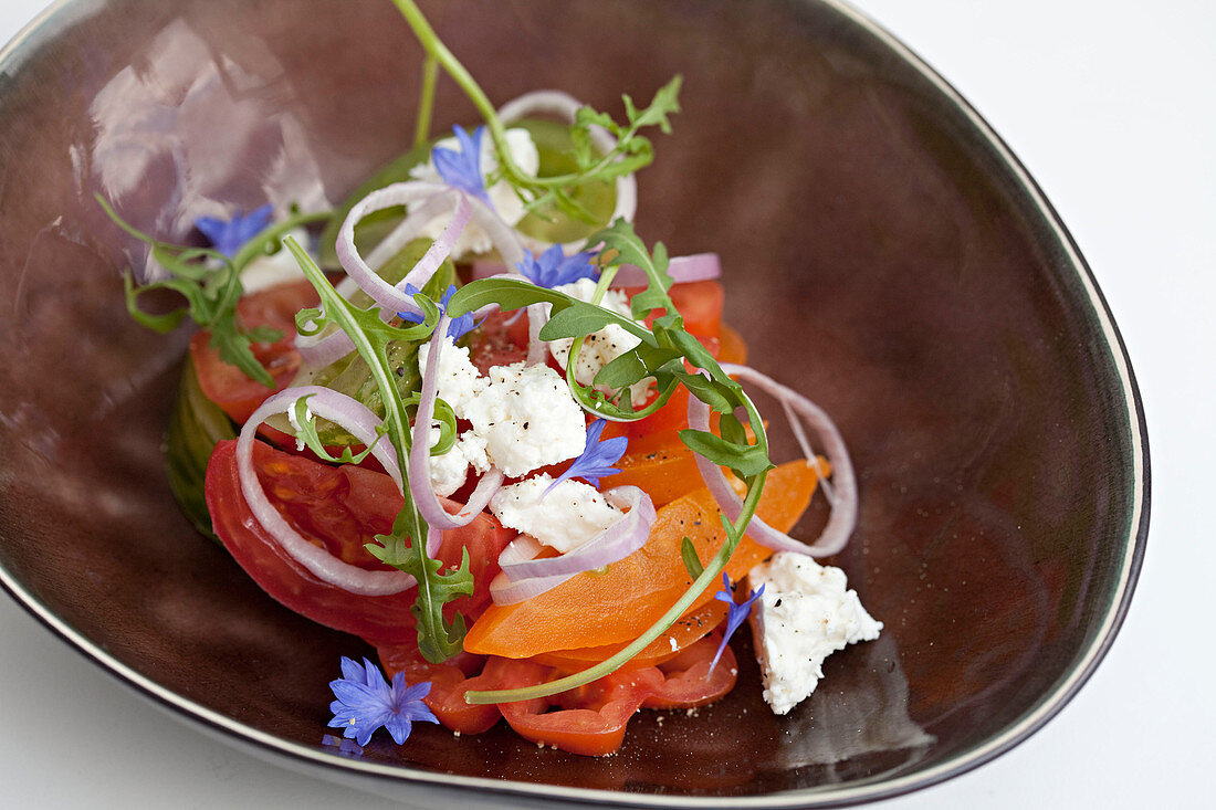 Feta cheese tomato salad with wildflower