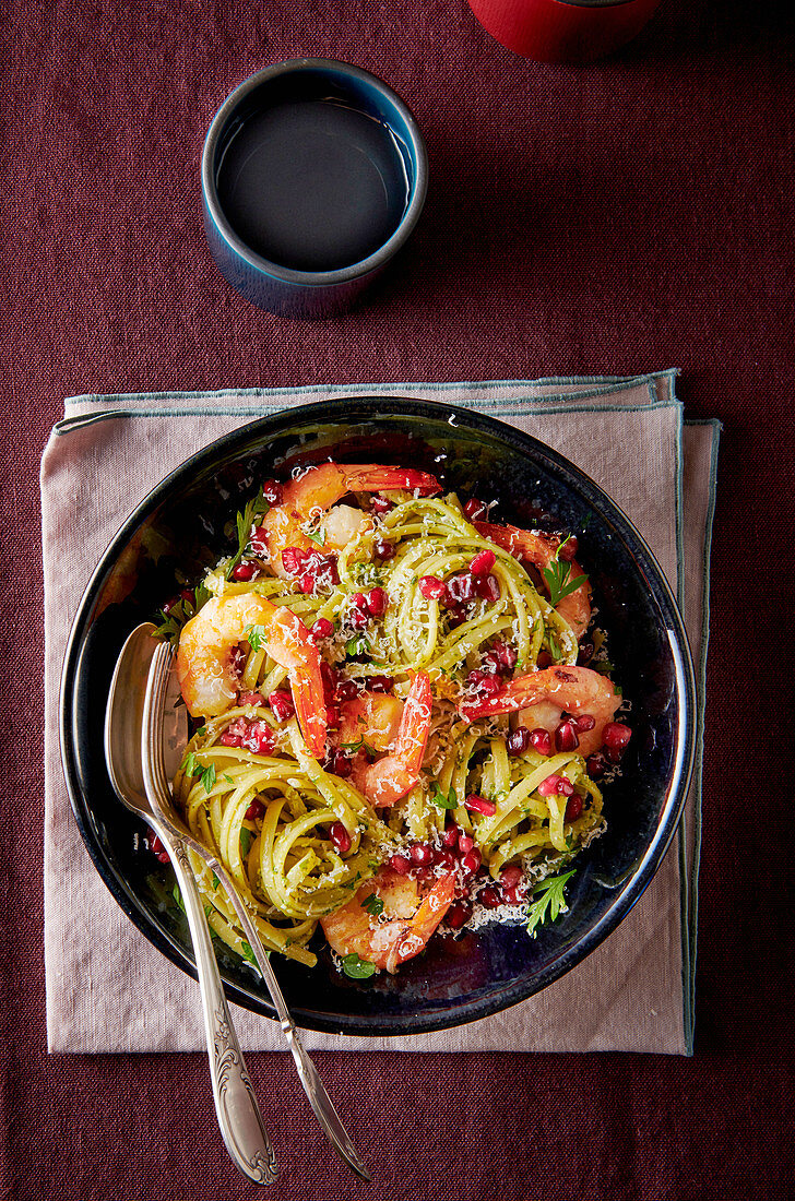 Linguine with prawns and pomegranate seeds