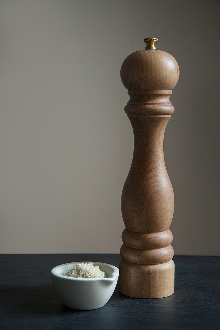 Sea salt and a wooden pepper mill