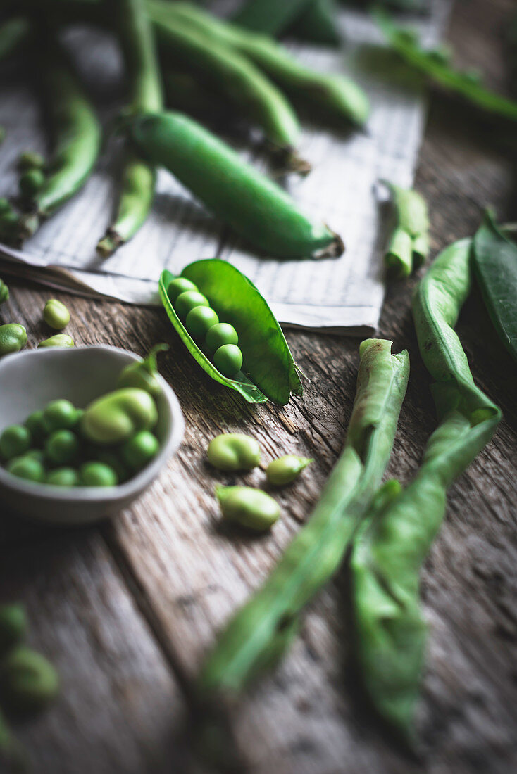 Green peas on newspaper