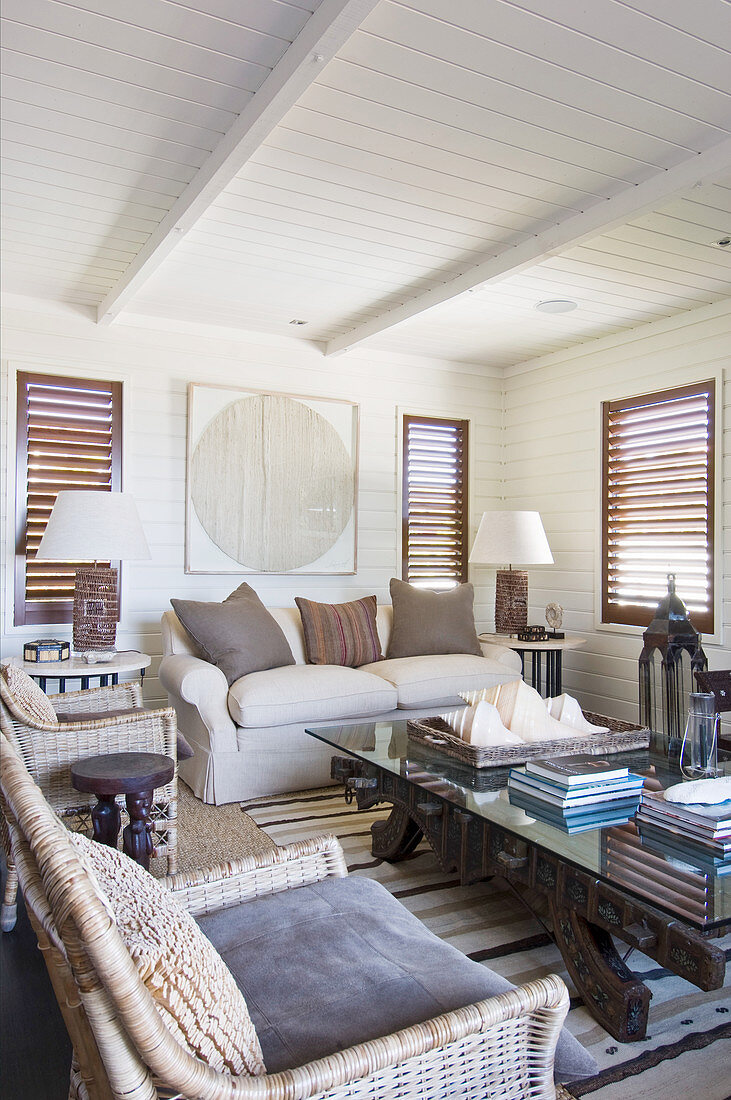 Louvre windows in living room in earthy shades