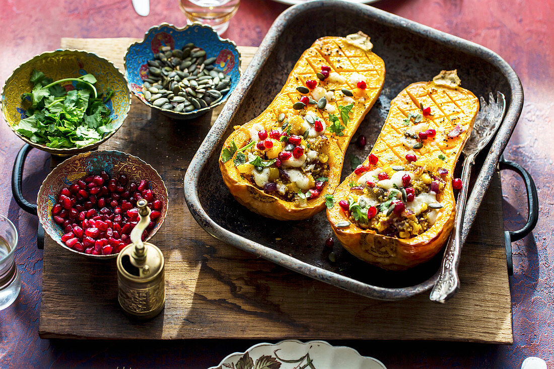 Middle eastern roasted butternut squash with quinoa and pomegranate