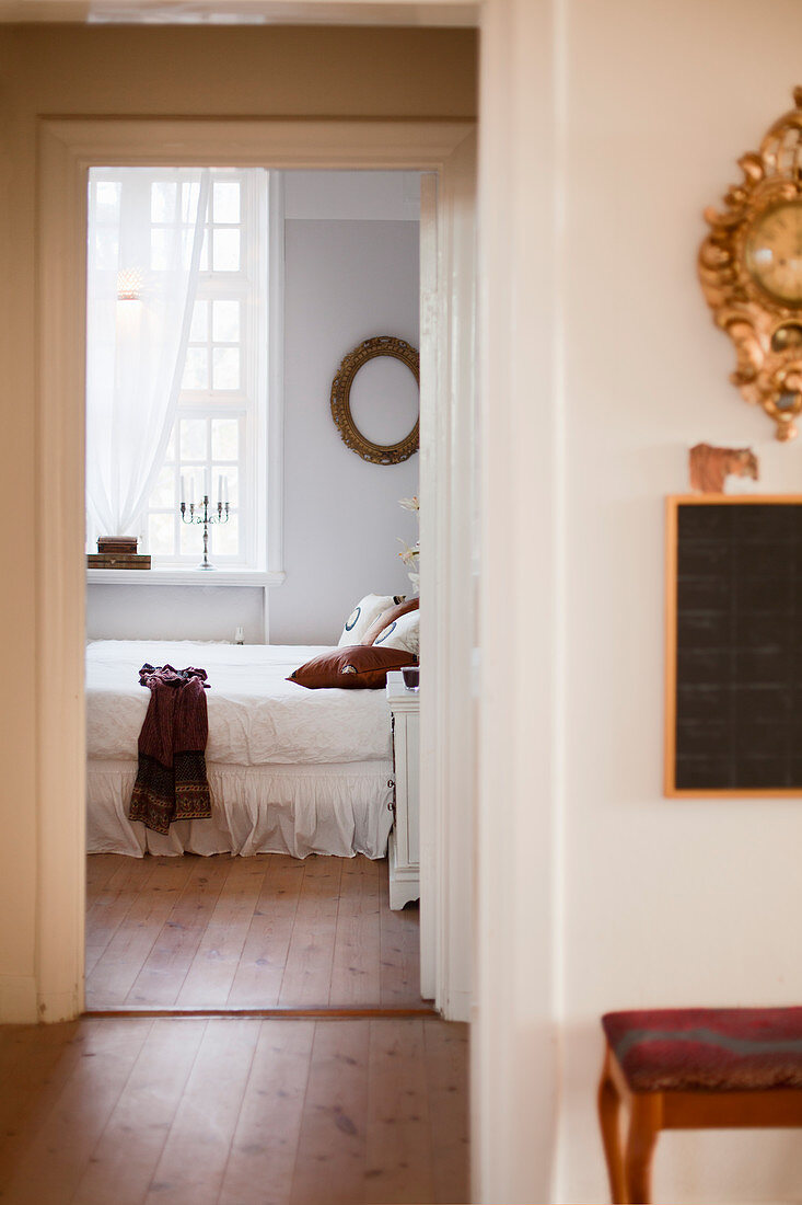 Double bed and lattice window in bedroom