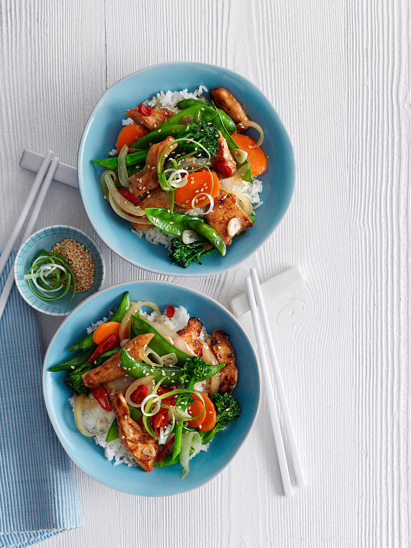 Wok chicken with colourful vegetables and rice