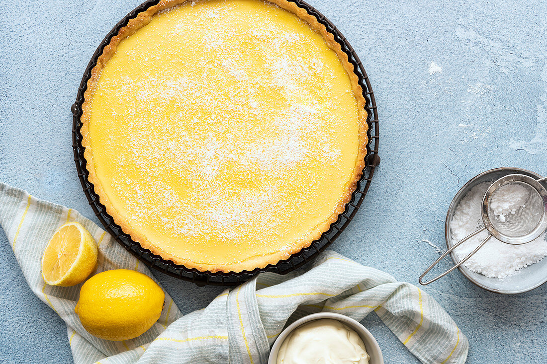 Homemade lemon tart dusted with icing sugar