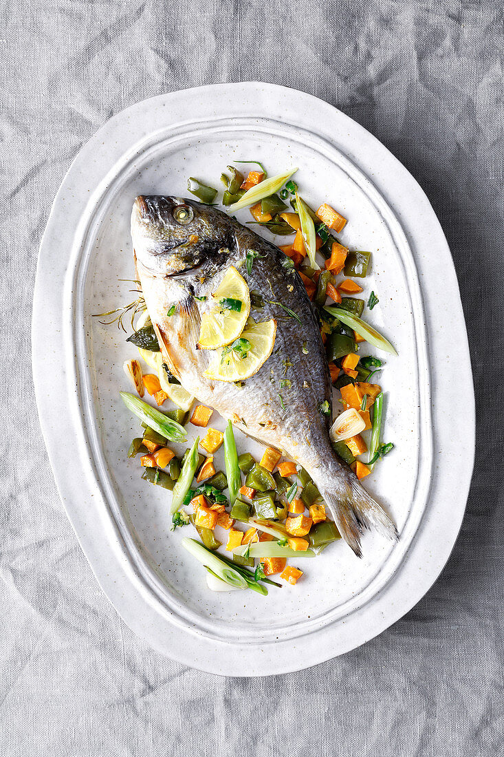 Chilli seabream with sweet potatoes and peppers