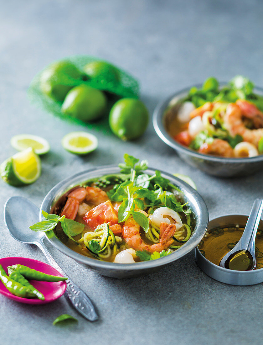 Spicy tom yum soup with litchis and prawns
