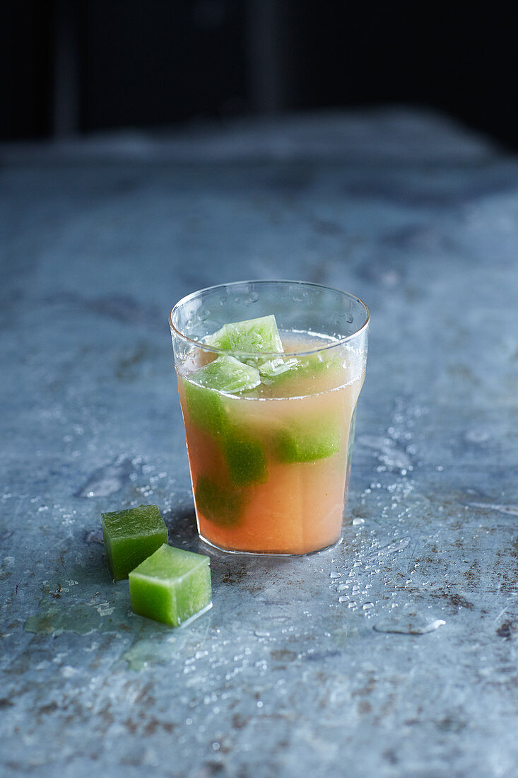 Spicy tomato juice with basil ice cubes