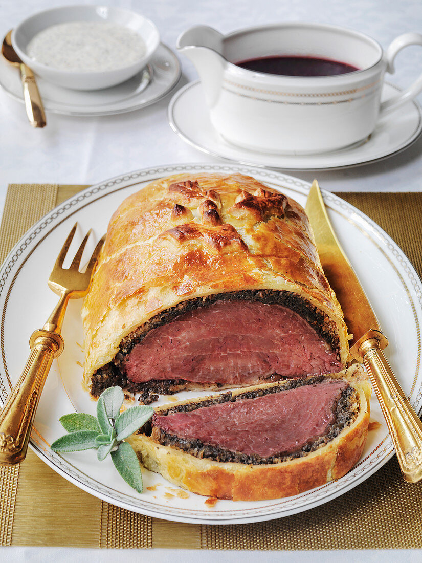 Bouef en Croute Fillet of Beef in pastry with rich gravy and horseradish sauce
