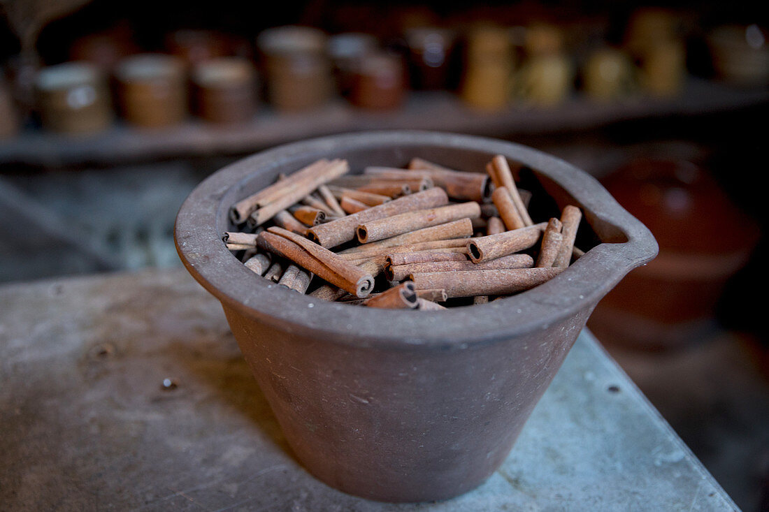 Cinnamon quills in an antique stonewear bowl
