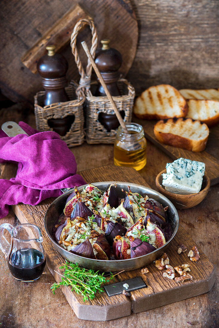 Figs baked with blue cheese, walnuts, honey and thyme