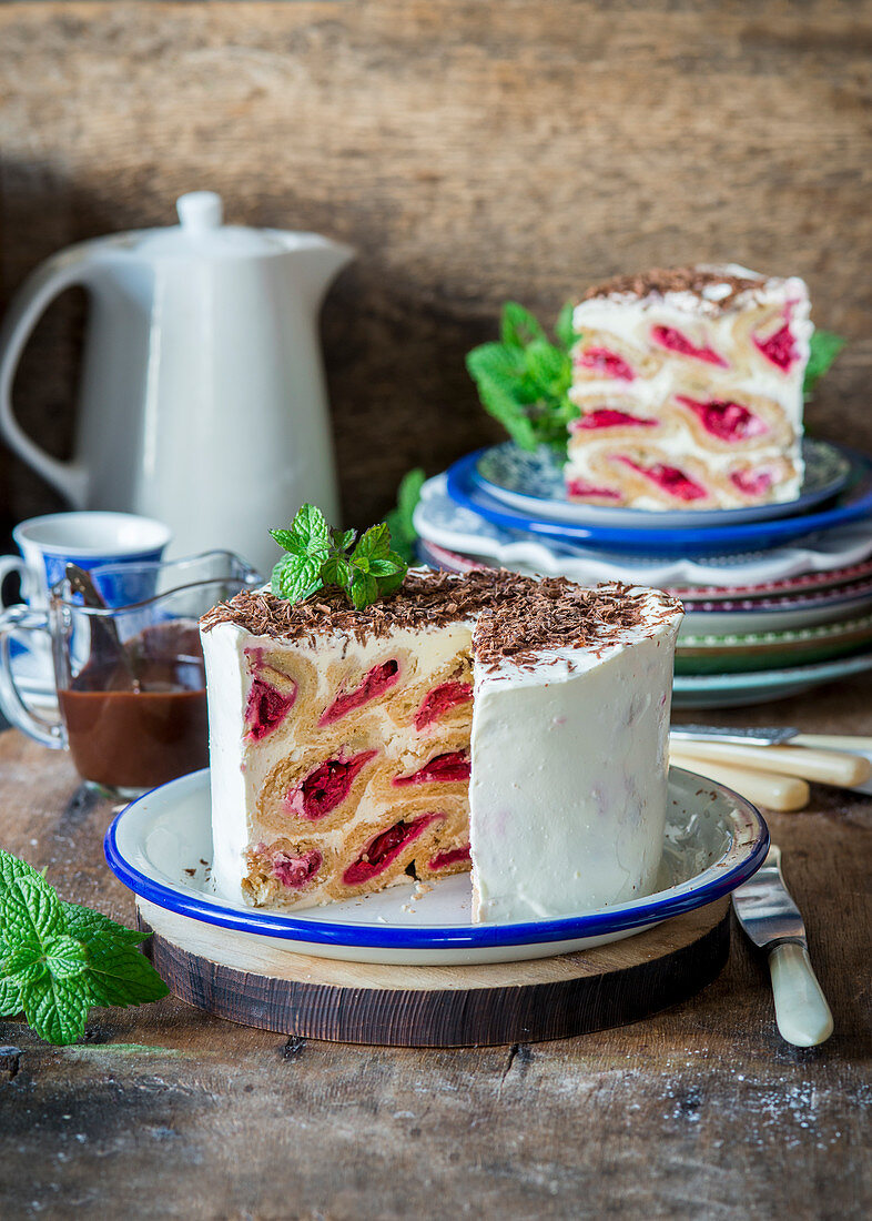 Izba (Russian cake) made with pastry filled with cherries and sour cream