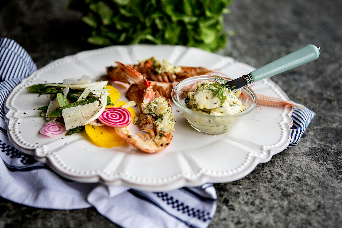 Grilled prawns with herb butter and a side salad