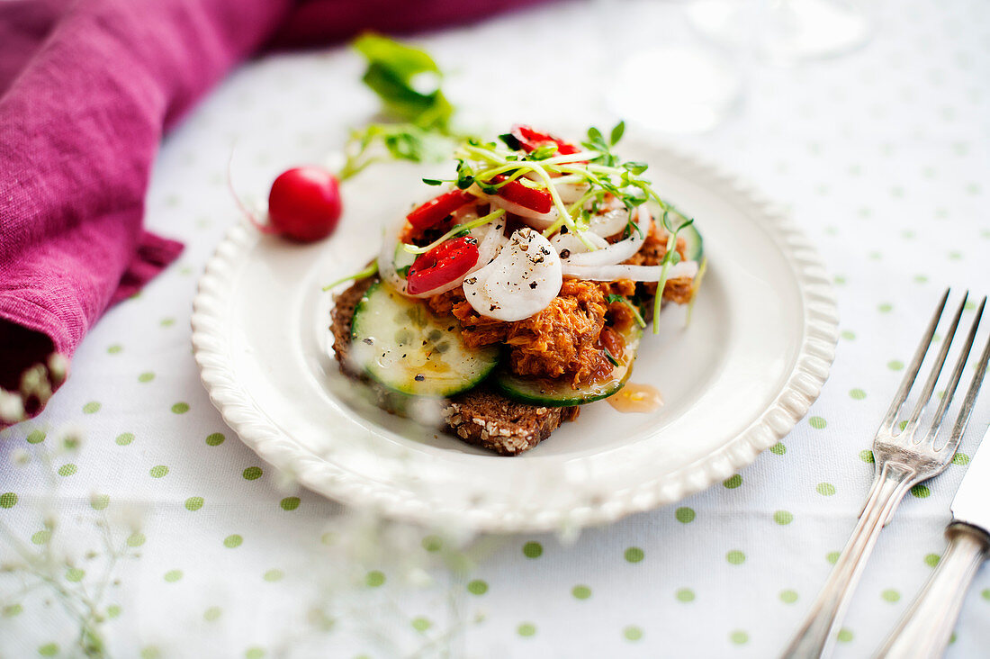 Wholemeal bread with mackerel, cucumber and radishes