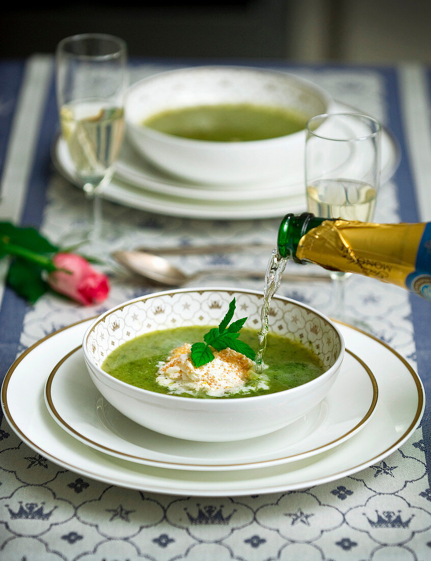 Green summer soup with champagne and cream for a wedding