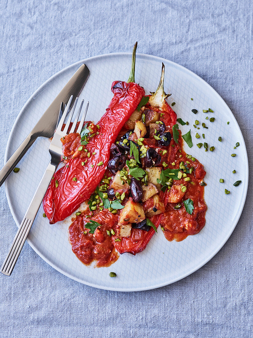 Stuffed pointed red peppers with potatoes and olives
