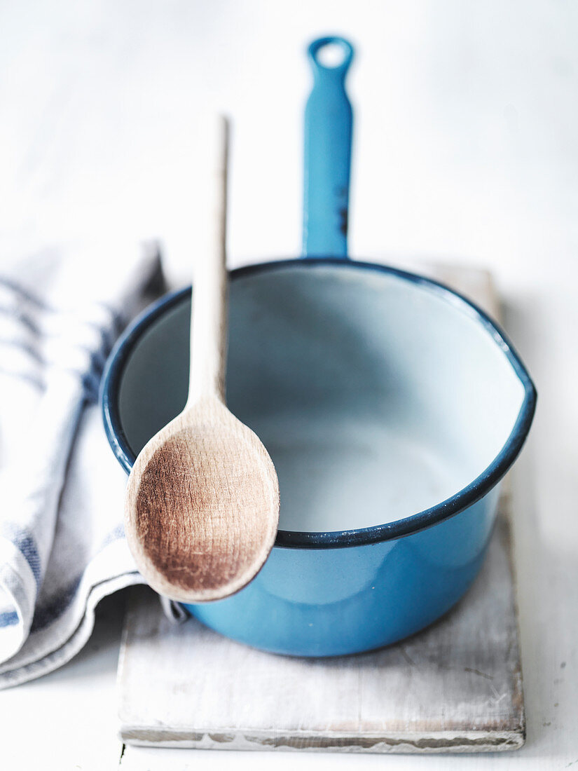 Blue Saucepan and wooden spoon