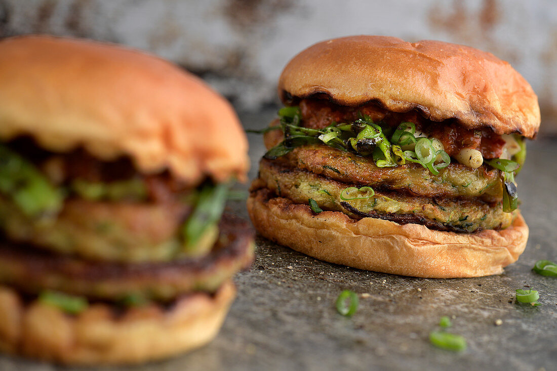 Vegetarian courgette burgers with grilled onions