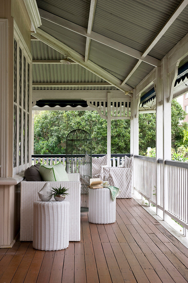 White rattan furniture on veranda