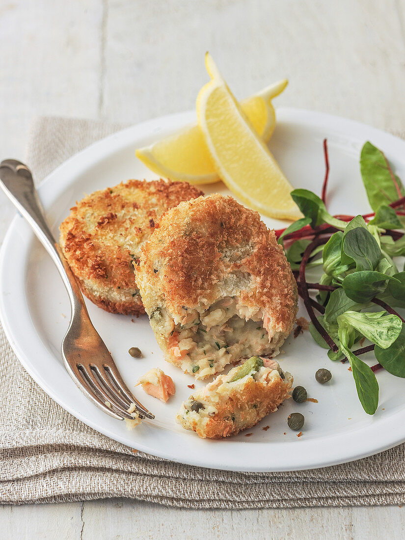 Salmon fish cakes with capers with beetroot leaves