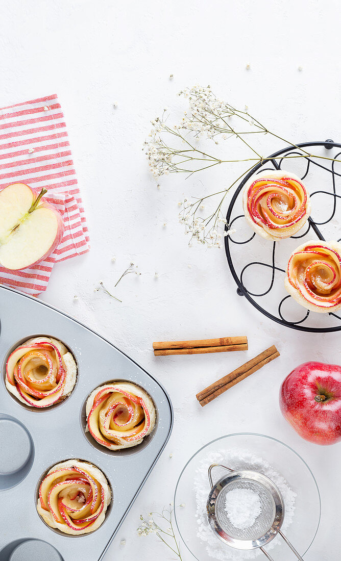 Tasty fresh baked roses made of red sweet apples